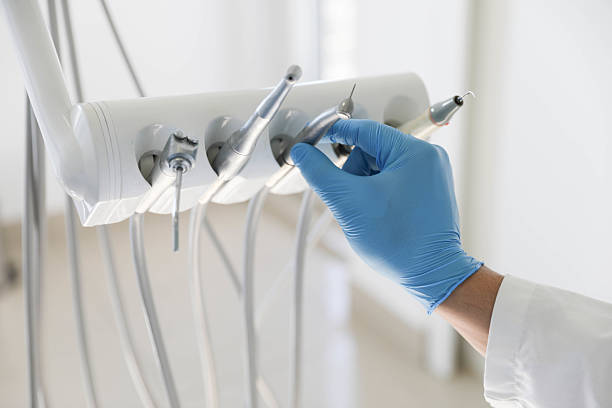 Professional Tooth Extraction technician working in Warr Acres, OK